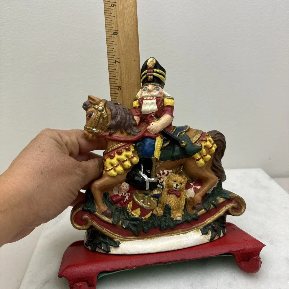 Cast Iron Christmas stocking hanger Nutcracker rocking horse double hook Vintage